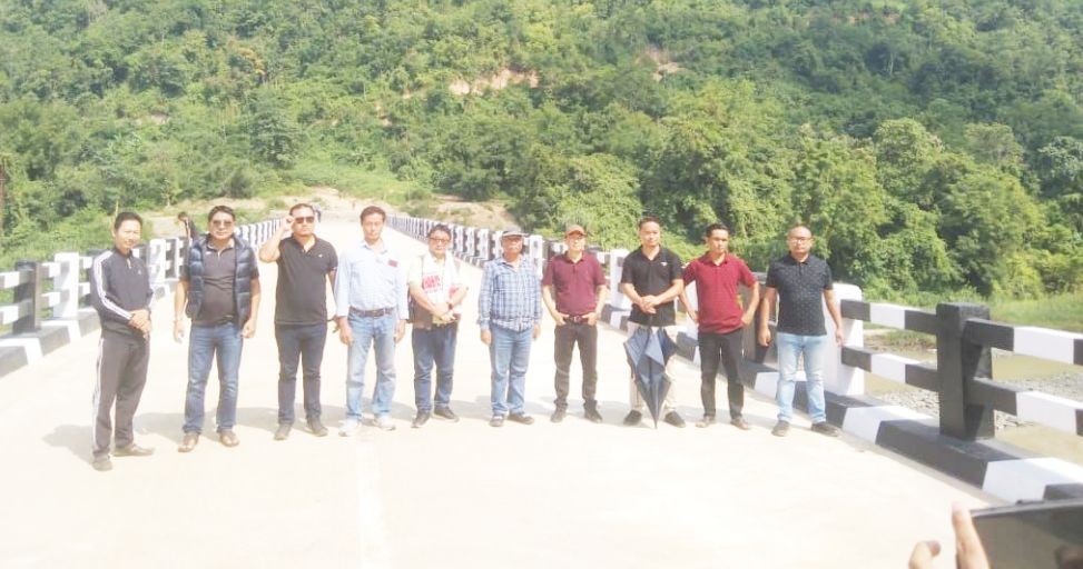 The joint inspection team comprising of NFHRCC, PWD (R&B), Additional CE (R&B), Superintendent Engineers, Divisional Executive Engineers and the Foothill Road Contractors at the Doyang Bridge at Governor’s Camp, Liphanyan on October 20. (Photo Courtesy: NFHRCC)